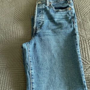 Levi’s size 28, ribcage straight leg.